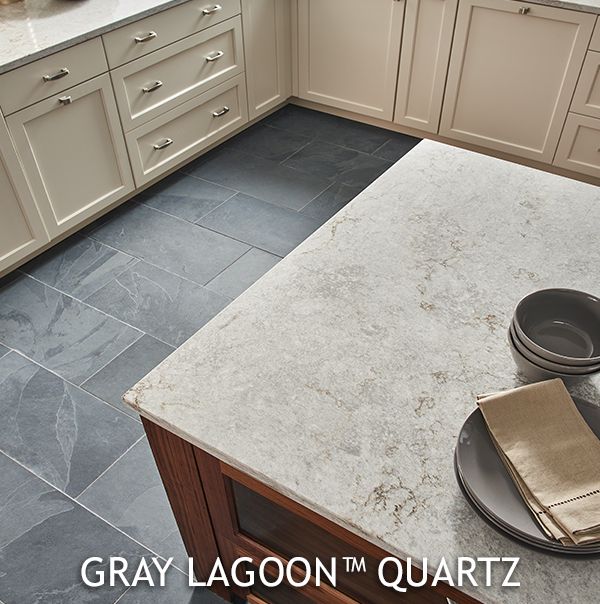 Gorgeous kitchen island with new Gray Lagoon Quartz