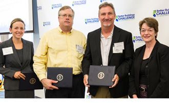 Kristen Taddonio and Dr. Kathleen Hogan of DOE recognize Better Buildings Alliance Steering Committee chairs for their leadership, including John Krolicki and John Scott pictured here.
